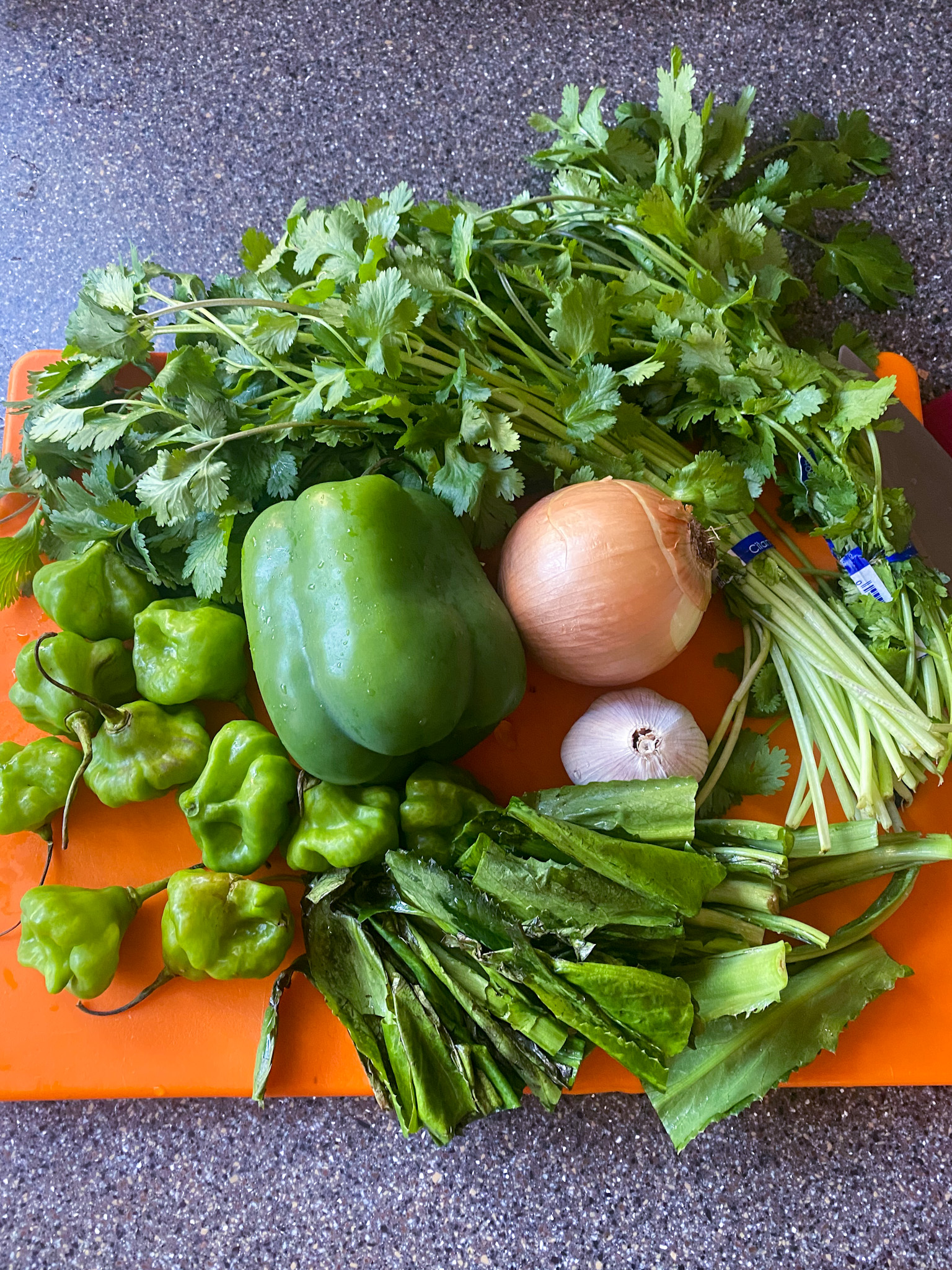 Sofrito ingredients on a cutting board